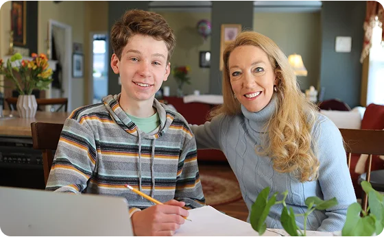 mom and her son smiling