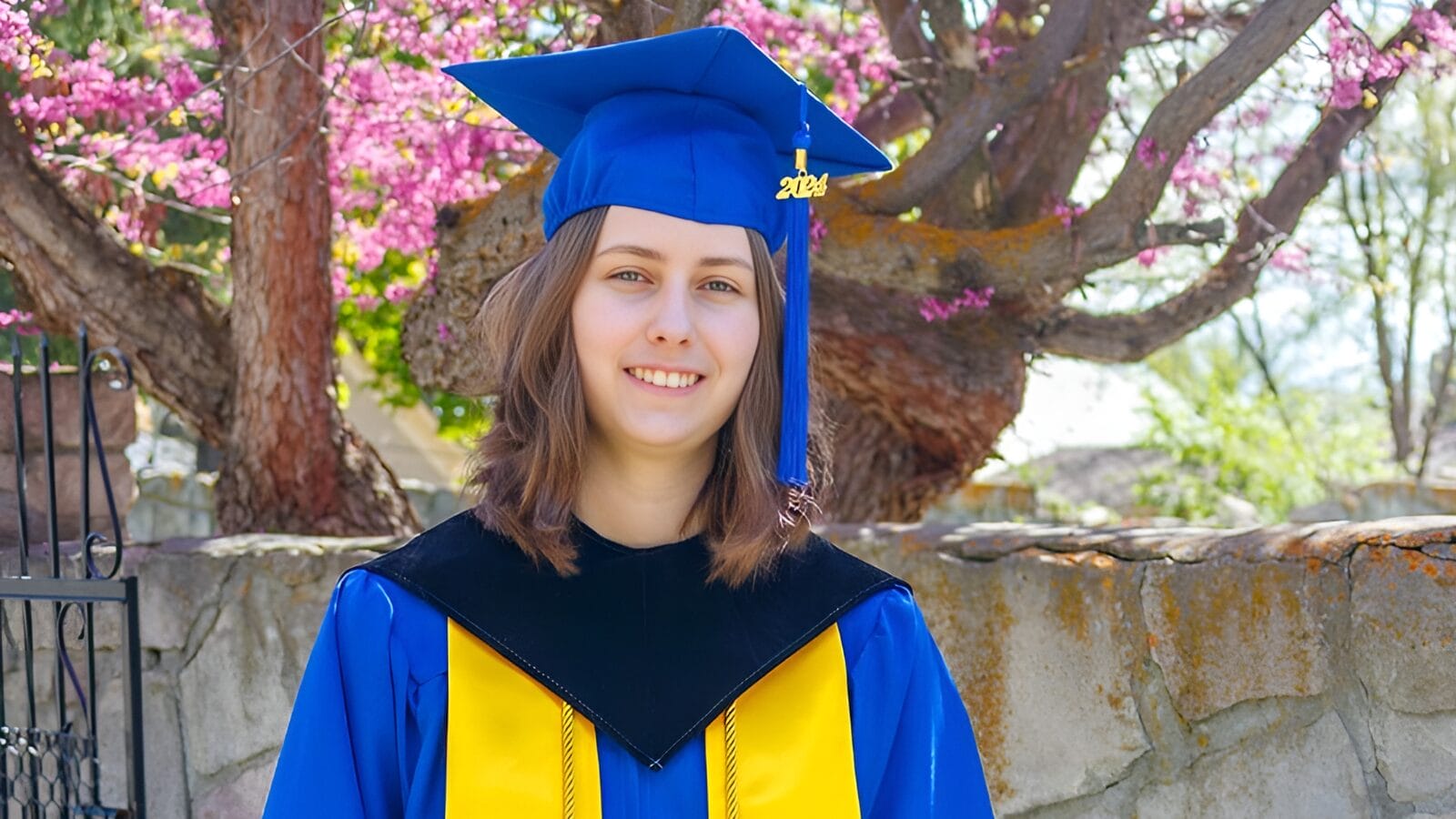 young man in graduation gown