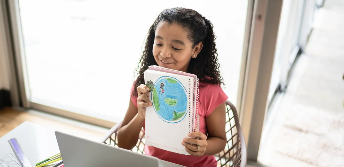 girl with notebook in her hands